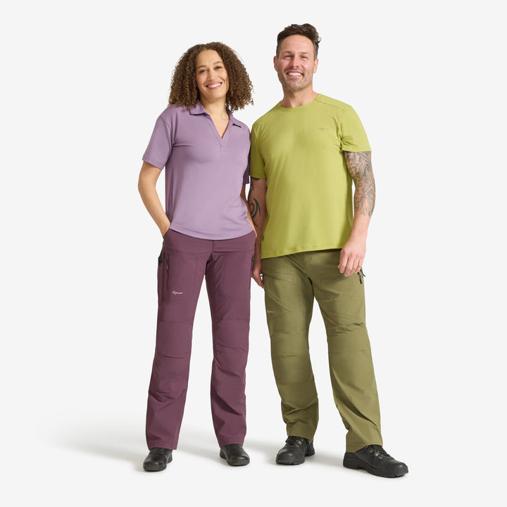 Woman wearing a Genus Cardoon Eden Collared Tee with a man