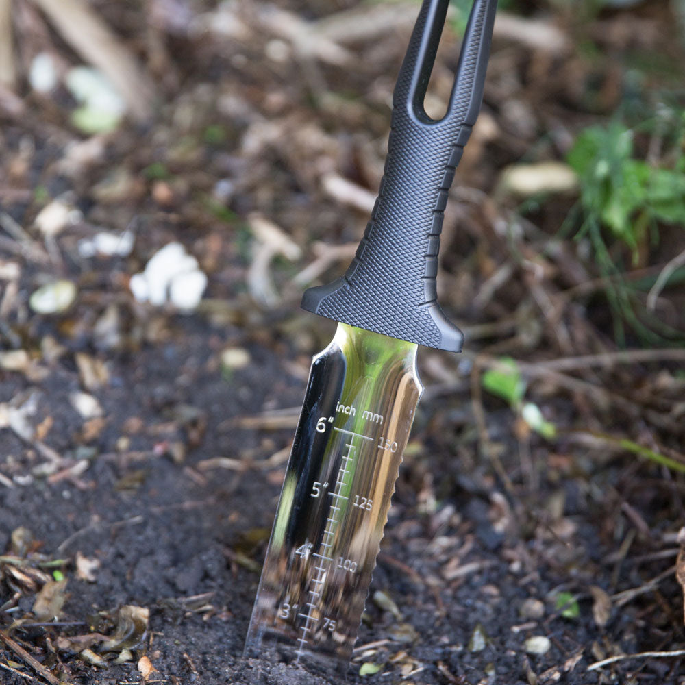 Genus Hori Hori Tool in a garden