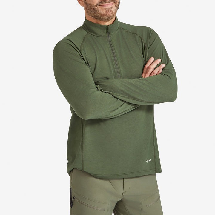 Man wearing a Genus Men's Dark Green Eden Zip Neck Top