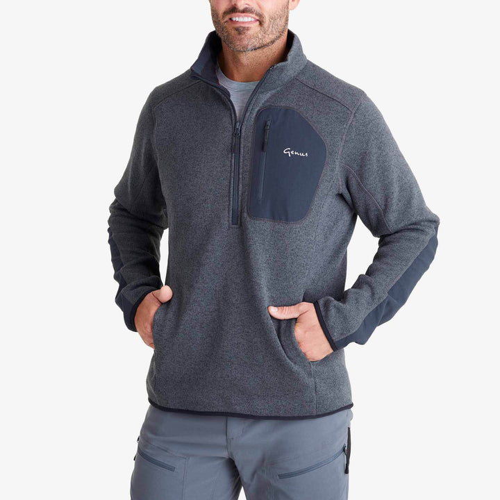 Man wearing a Genus Men's Dixter Gardening Pullover holding his hips