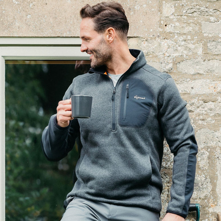Genus Men's Dixter Gardening Pullover on a man holding a cup of tea