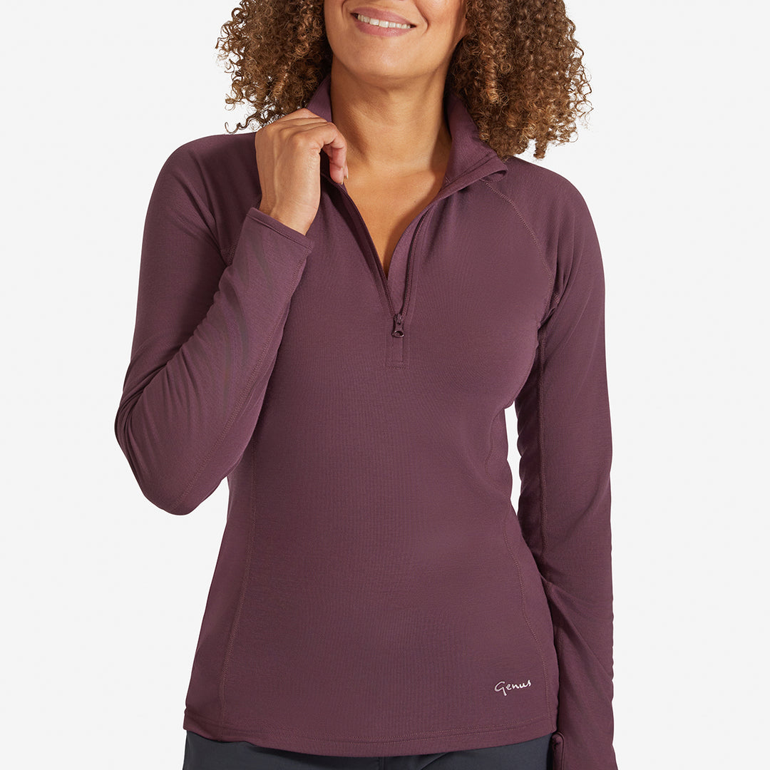 Close up view of a Genus Women's Prune Damson Eden Zip Neck Top 