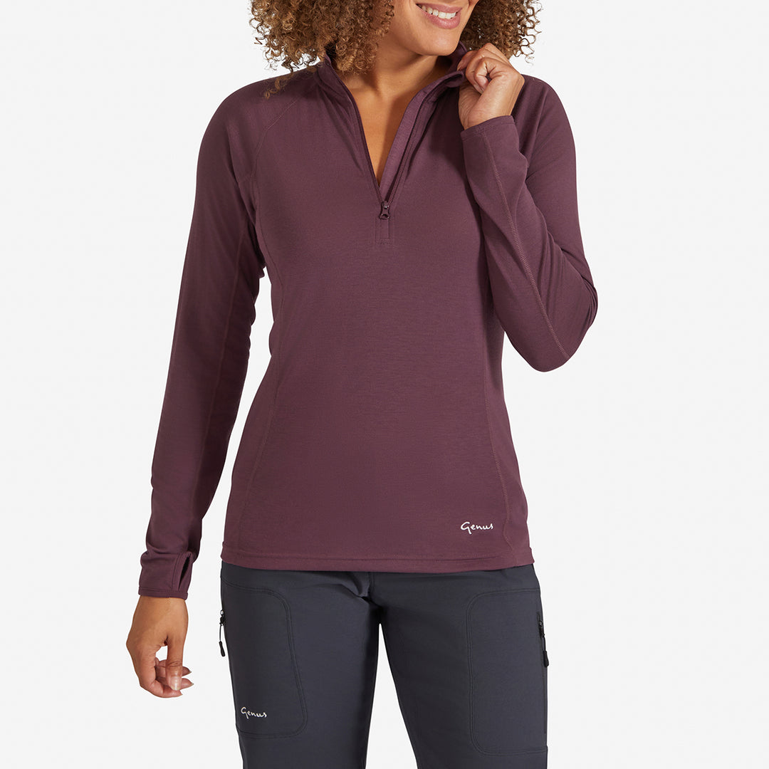Woman wearing a Genus Women's Prune Damson Eden Zip Neck Top 