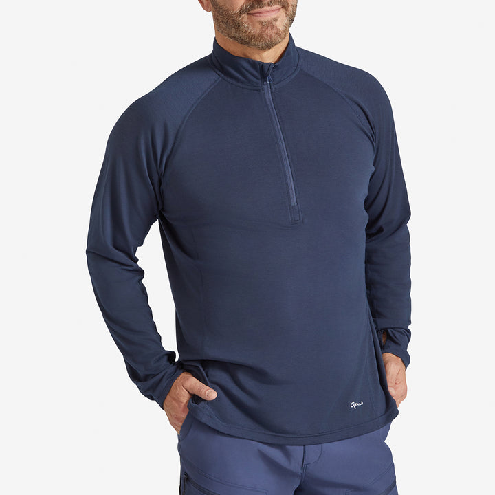 Man wearing a Genus Men's Marine Blue Eden Zip Neck Top 