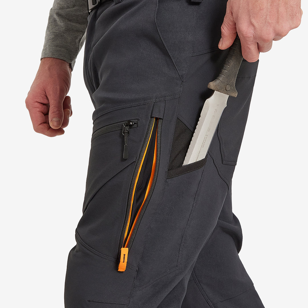 Garden knife going into the Genus Men's Gardening Propant pockets