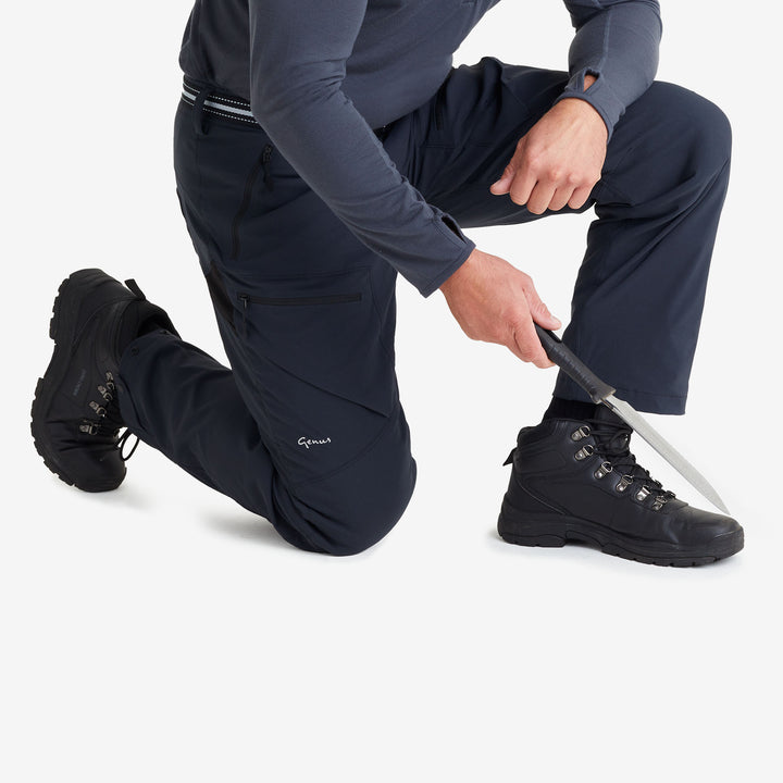 Man wearing a pair of Genus Men's Waterproof Gardening Trousers Midnight