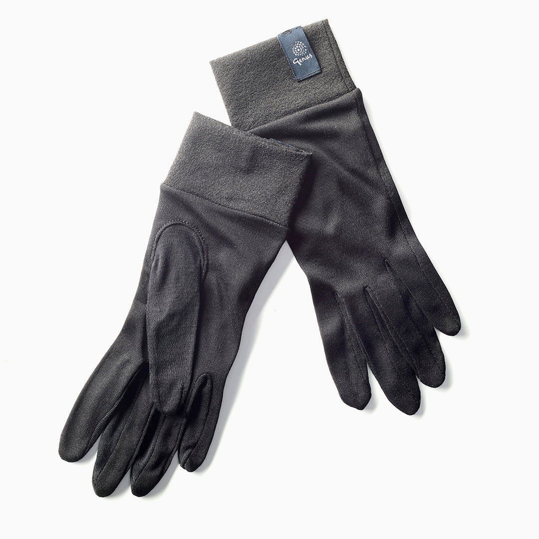 Genus silk gardening gloves on a white surface