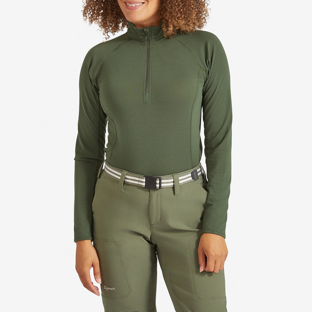 Woman wearing a Genus Women's Dark Green Eden Zip Neck Top