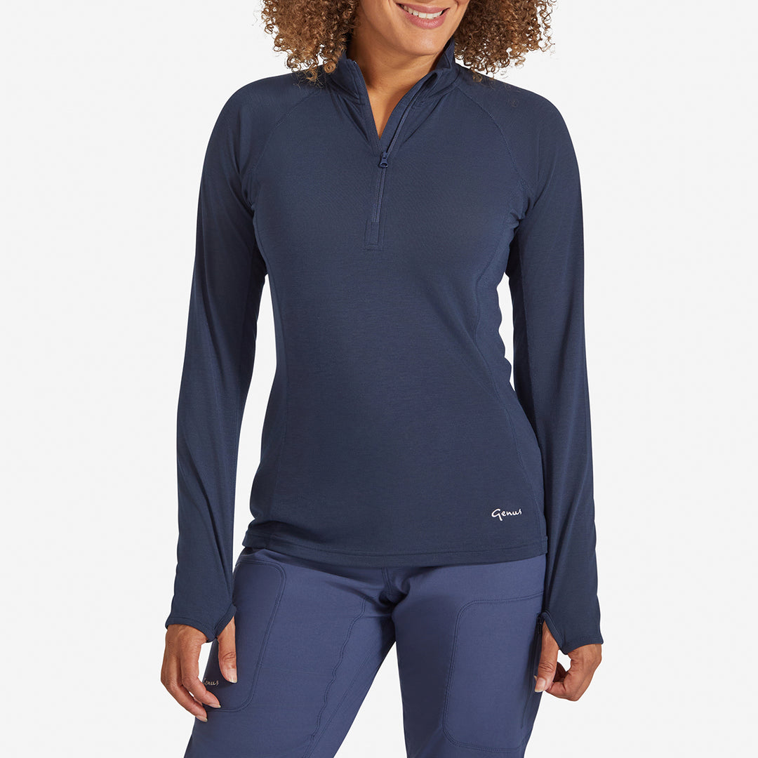 Woman wearing a Genus Women's Marine Blue Eden Zip neck Top