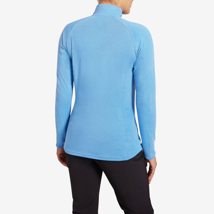 Back view of the Genus Women's Parisian Blue Eden Zip Neck Top